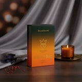 Soghaat Midnight Booz 100ml Eau de Parfum box with amber, orange, and green gradient. Unisex oriental woody fragrance.