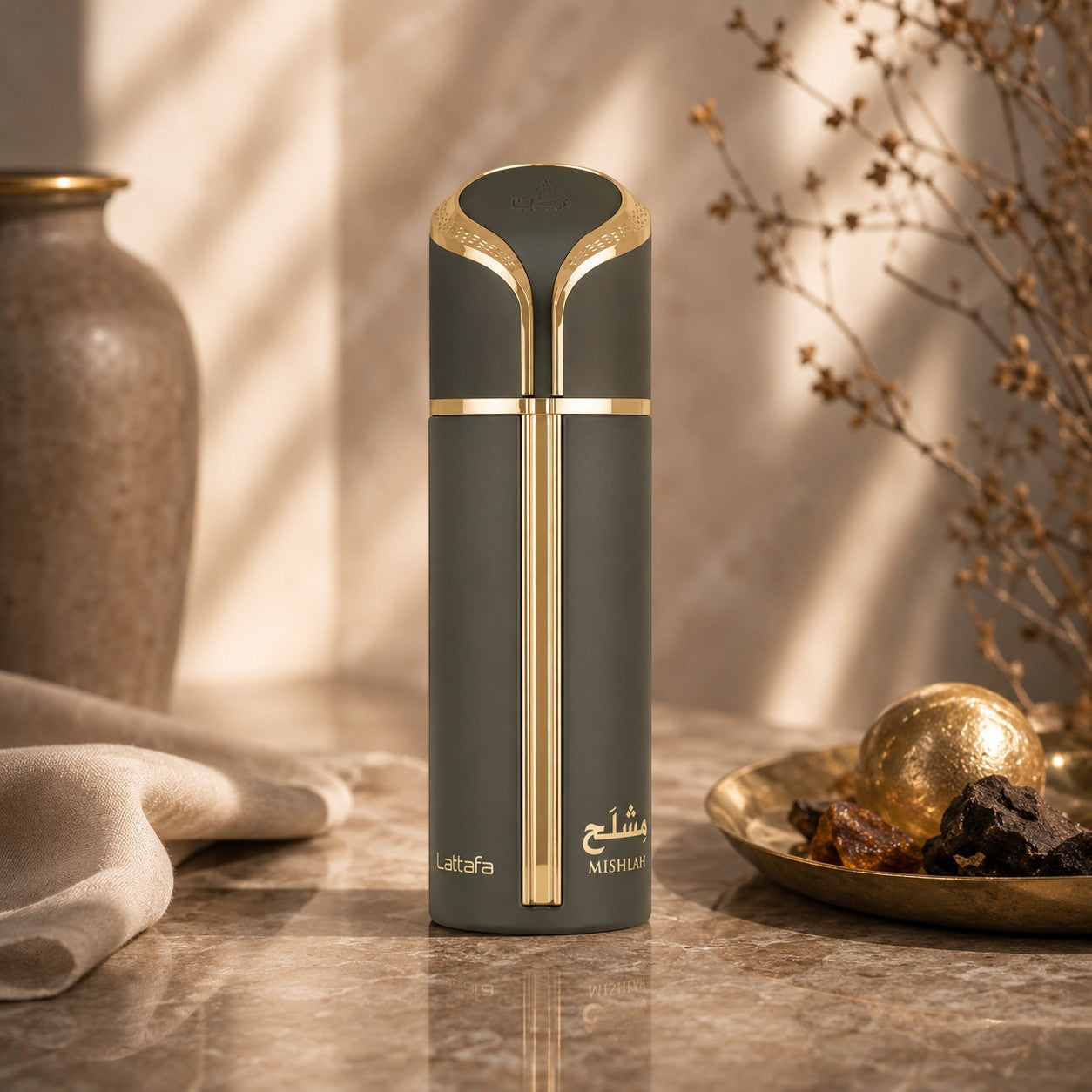 Soghaat Mishlah 100ml Eau de Parfum for Unisex, a dark green bottle with gold accents and Arabic script.