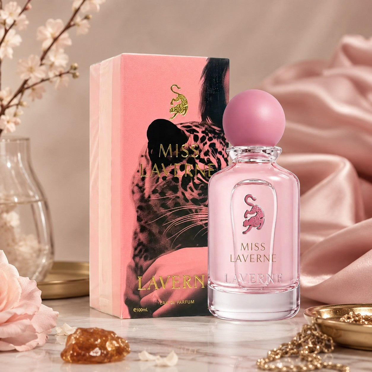 Soghaat Miss Laverne 100ml Eau de Parfum bottle and pink box featuring a leopard graphic, set on a marble surface.