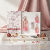 Soghaat Miss Laverne Extreme Perfume Gift Set for women, includes 150ml perfume, 25ml perfume, 25ml hair perfume, and pink scarf. Pink gradient bottles.