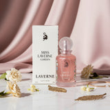 Soghaat Miss Laverne Garden 100ml Eau de Parfum for women, a fruity floral fragrance with a pink frosted bottle and floral accents.