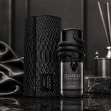 Soghaat Lattafa Musamam Black Intense Eau de Parfum bottle with a snake design next to its textured black case.