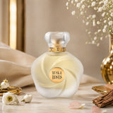 Soghaat Ahmed Al Maghribi Musk & Roses Extrait de Parfum in a frosted glass bottle with gold accents and floral decor.