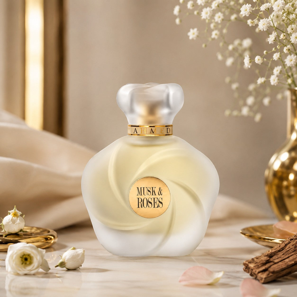 Soghaat Ahmed Al Maghribi Musk & Roses Extrait de Parfum in a frosted glass bottle with gold accents and floral decor.