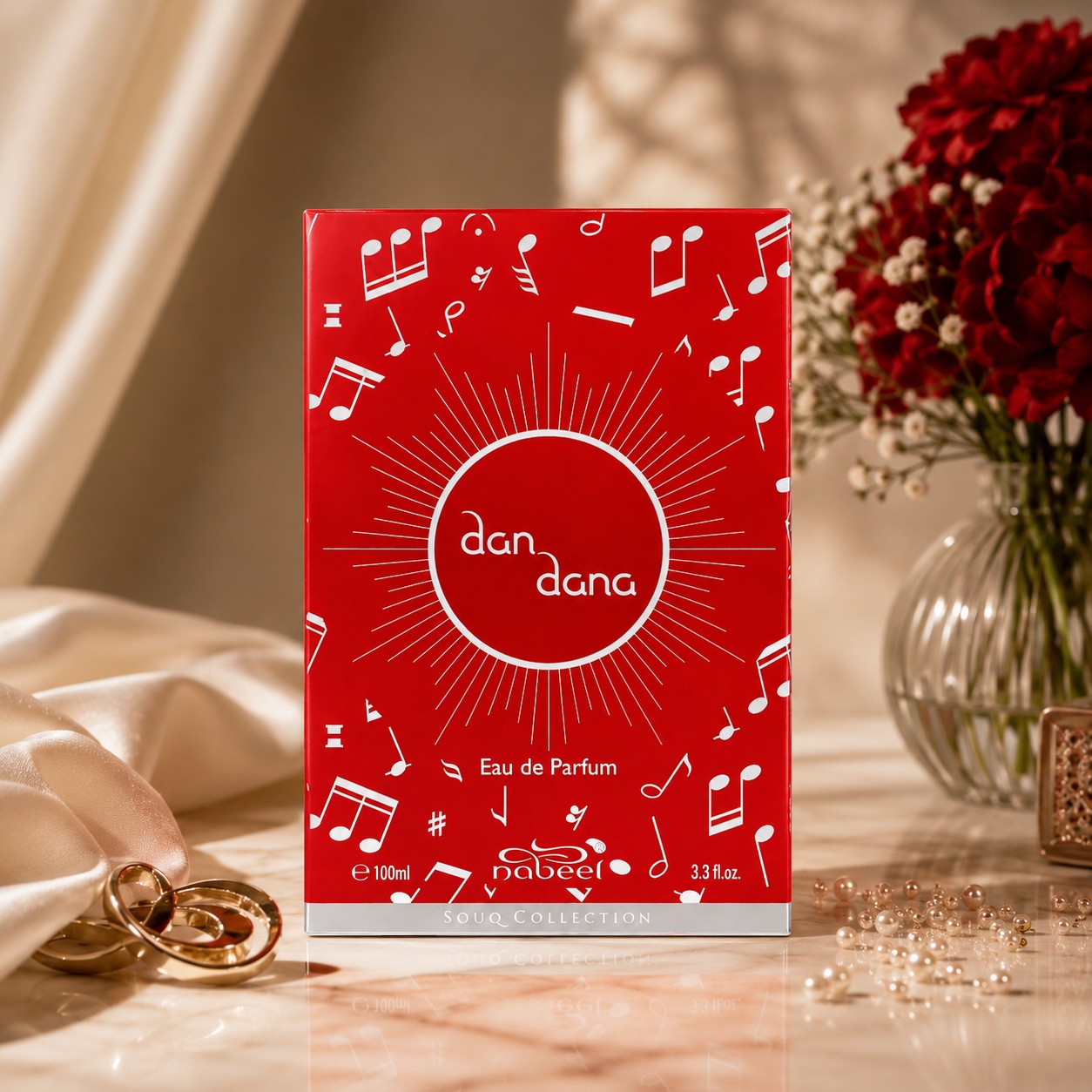 Soghaat Nabeel Dan Dana 100ml Eau de Parfum in a vibrant red box with musical note motifs, displayed on a marble surface.
