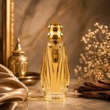 Soghaat Nabeel Oud Cafu Eau de Parfum in an elegant gold-toned glass bottle with a metallic cap on a marble surface.
