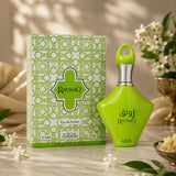 Soghaat Nabeel Raunaq Eau de Parfum bottle and box in bright green with intricate geometric patterns on a marble surface.