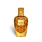 Soghaat Nectare Extradose Extrait de Parfum bottle with gold honeycomb design and amber liquid.