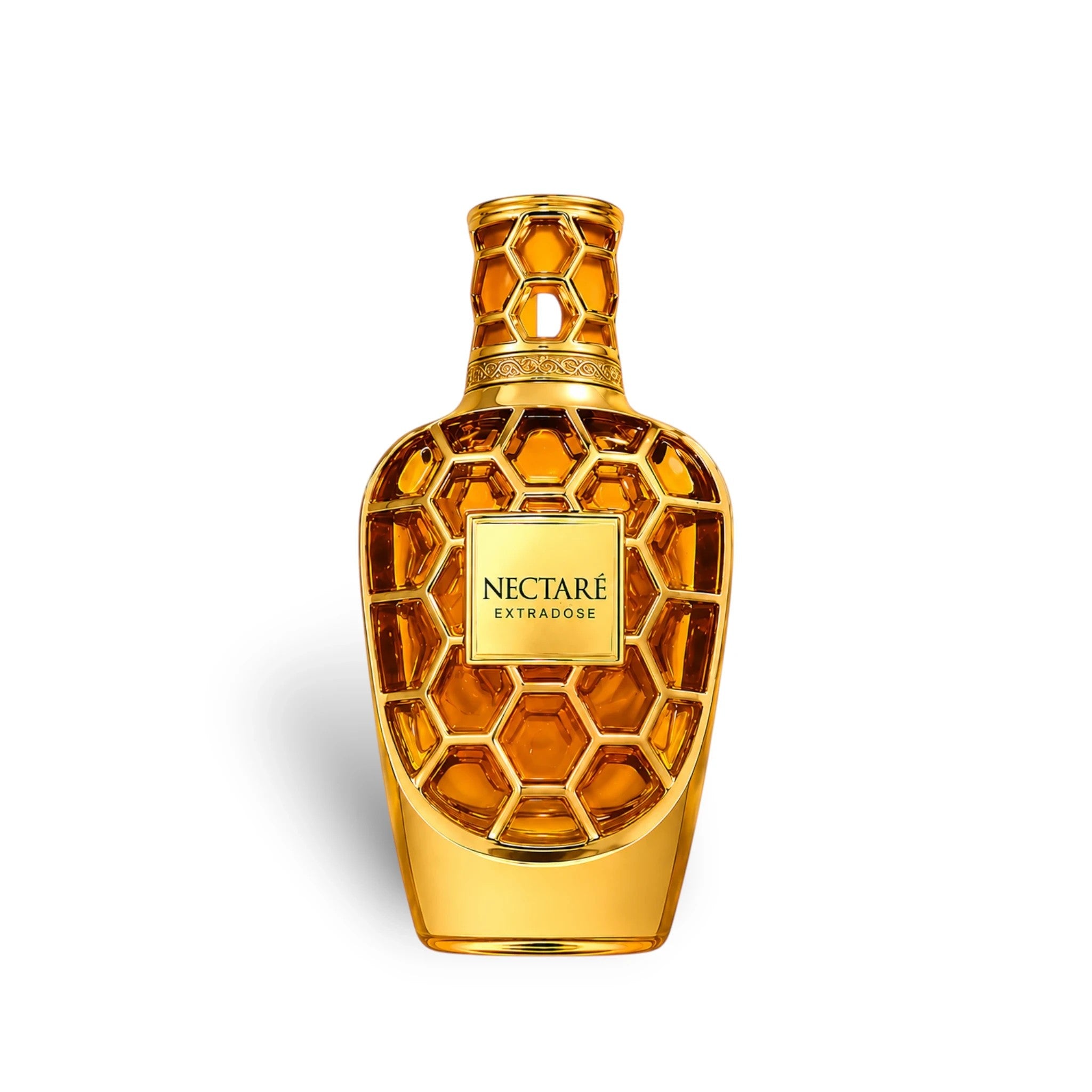 Soghaat Nectare Extradose Extrait de Parfum bottle with gold honeycomb design and amber liquid.