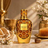 Soghaat Nectare Extradose Extrait de Parfum, a golden honeycomb-shaped bottle with a warm amber liquid.