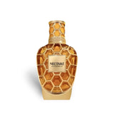 Soghaat Nectare Extradose Extrait de Parfum, a unisex woody, fresh citrus, and floral fragrance in a honeycomb-shaped amber glass bottle.