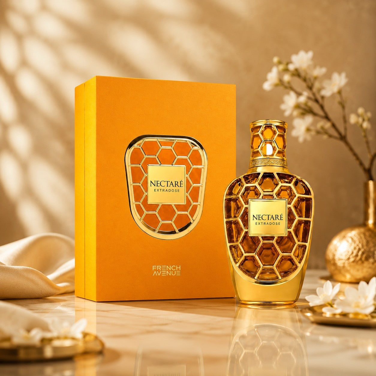 Soghaat Nectare Extradose Extrait de Parfum bottle and box, featuring a honeycomb design in gold and amber.