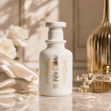 Soghaat The Night Tears 100ml Eau de Parfum, a white ceramic bottle with gold floral accents and text.