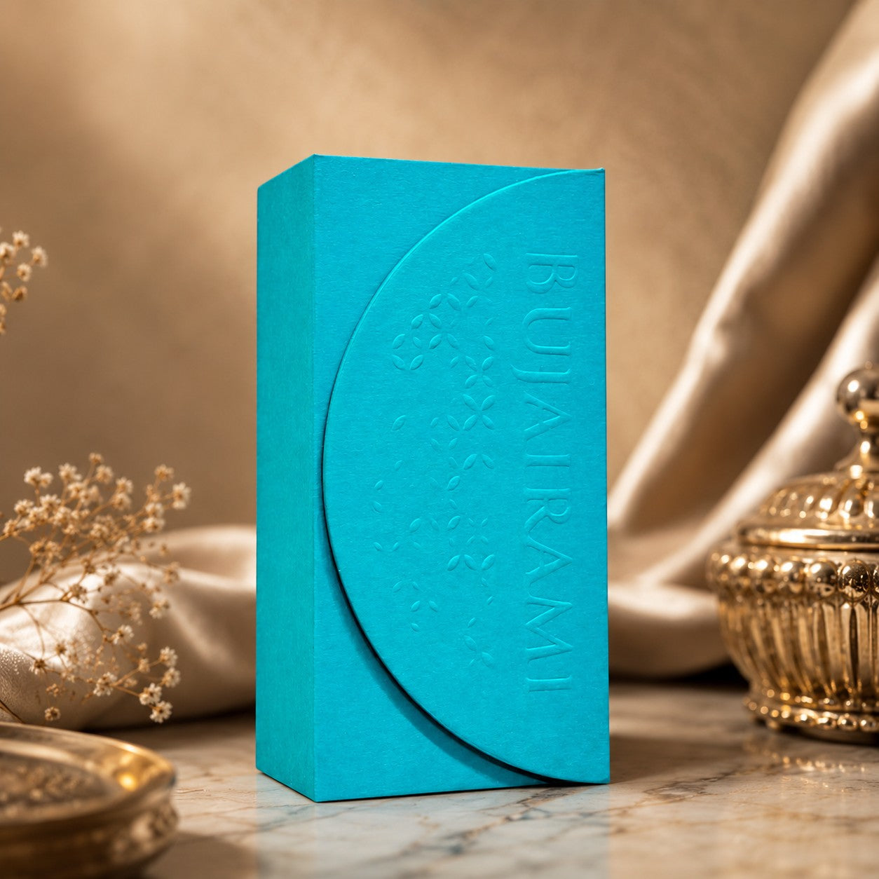 Soghaat Non Stop 100ml Extrait de Parfum for men, turquoise box with embossed floral pattern and brand name.