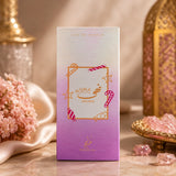 Soghaat Nuha Bon Bon 85ml Eau de Parfum box with candy cane and star accents, featuring strawberry, milk, peach, orange blossom, ice cream, and vanilla notes.