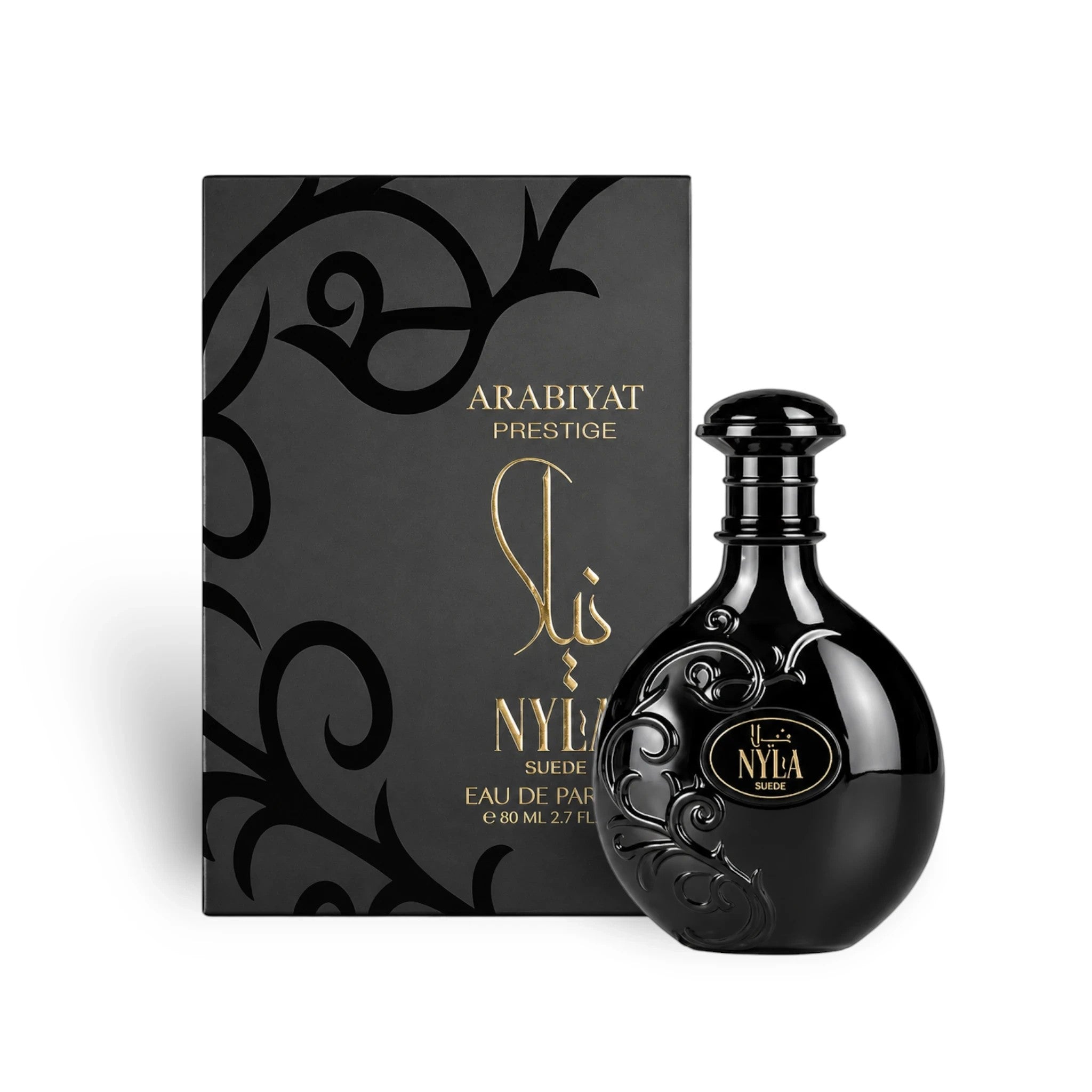 Soghaat Arabiyat Prestige Nyla Suede 80ml Eau de Parfum bottle with its elegant black box featuring ornate gold details.