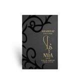 Soghaat Arabiyat Prestige Nyla Suede Eau de Parfum in a sleek black box with elegant gold calligraphy and scrollwork.
