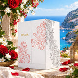 Soghaat Osma Charming Eau de Parfum white gift box with floral illustrations, set against a scenic coastal backdrop.