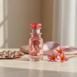 Soghaat Osma Romance Eau de Parfum 150ml, a soft sweet musk fragrance with peach, rose, and floral notes in a clear glass bottle with a pink cap.