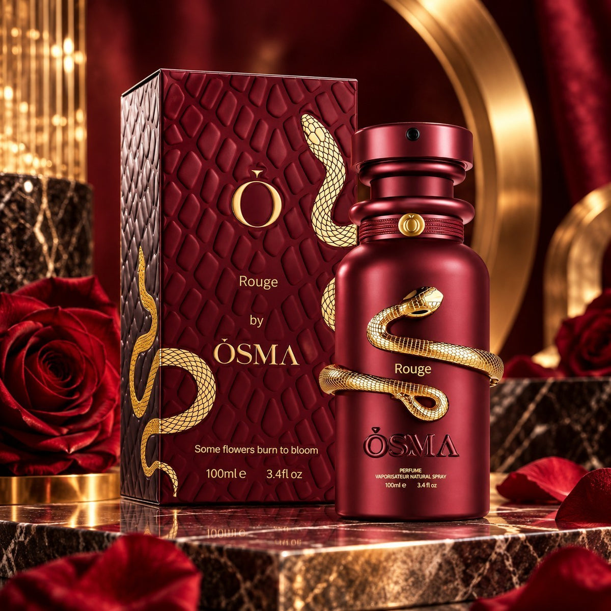 Soghaat Osma Rouge 100ml Eau de Parfum bottle and box with gold snake detail, surrounded by red roses on marble.