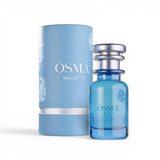 Soghaat Osma Woody S Eau de Parfum bottle and packaging. Blue glass bottle with silver cap and floral etching. Light blue cylindrical box.