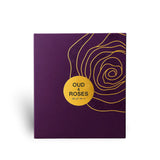 Soghaat Ahmed Al Maghribi Oud & Roses Eau de Parfum purple presentation box with gold rose line art and circular label.