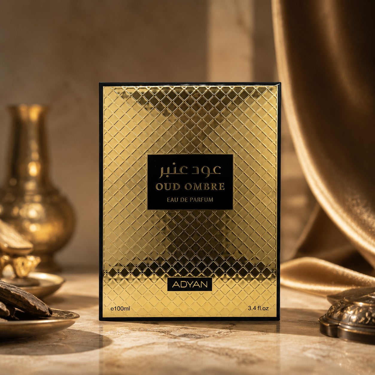 Soghaat Oud Ombre by Adyan Anfar 100ml Eau de Parfum in a luxurious gold textured box on a marble surface.