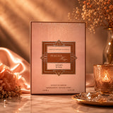 Soghaat Peachy Haze by Adyan Anfar Extrait de Parfum perfume box in a warm, elegant, and soft-lit setting.