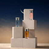 Soghaat Pegasus Collection Gift Set with three 100ml Eau de Parfum bottles: Celestial Sky (blue), Amber Oud (amber), and Aurora Blush (pink).
