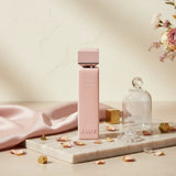 Soghaat Pink Lady Eau de Parfum, a fresh woody aromatic fragrance for women with notes of bergamot, orange blossom, white flowers, patchouli, and vanilla.