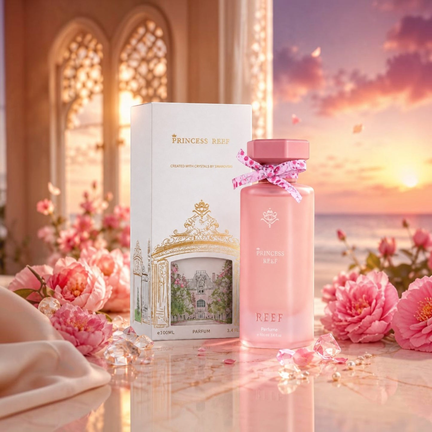 Soghaat Princess Reef 100ml Eau de Parfum in a pink bottle with a patterned ribbon, displayed with its box at sunset.