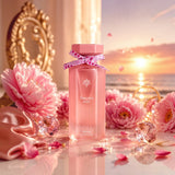 Soghaat Princess Reef 100ml Eau de Parfum in a pink bottle with a ribbon, surrounded by pink flowers and crystals.