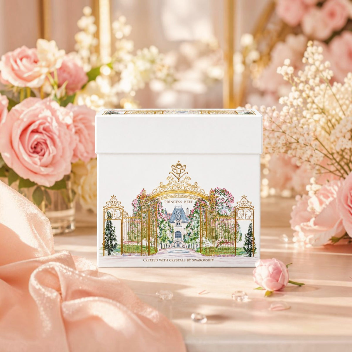 Soghaat Princess Reef Perfume gift set box featuring an ornate gold gate illustration, surrounded by pink roses.
