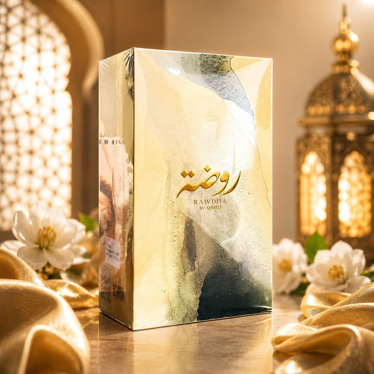 Soghaat Rawdha 50ml Extrait de Parfum box with gold and abstract design, set against a warm, elegant oriental backdrop.
