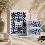 Soghaat Rayhaan Azul Eau de Parfum for men in a blue bottle with white geometric lattice, featuring citrus and wood.