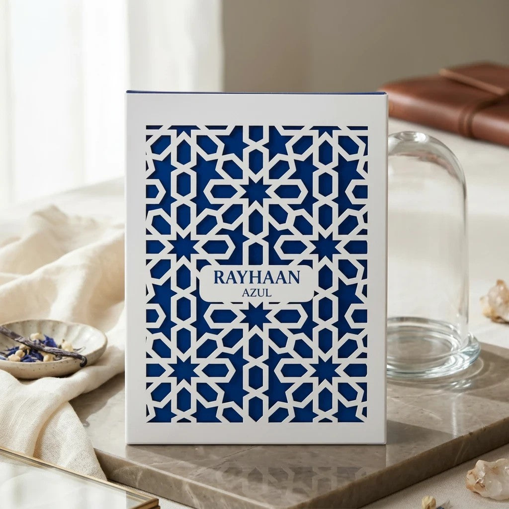 Soghaat Rayhaan Azul 100ml Eau de Parfum for men in a white box with blue geometric Arabian patterns.