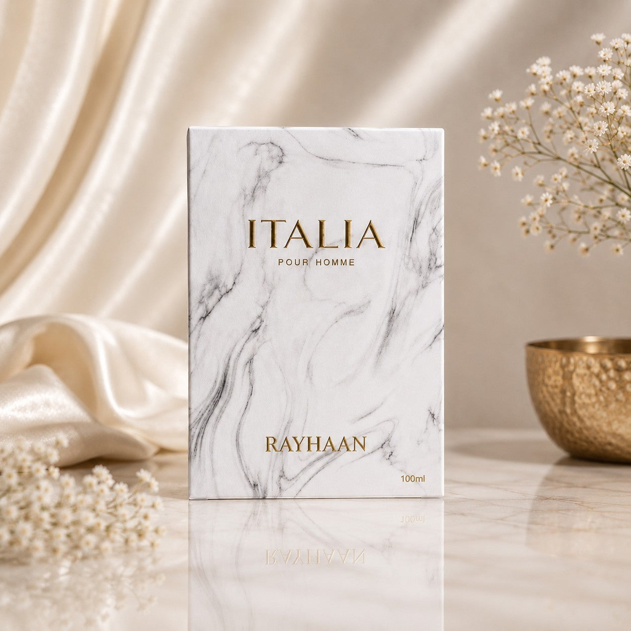 Soghaat Rayhaan Italia 100ml Eau de Parfum box with white marble pattern and gold lettering on a draped silk surface.