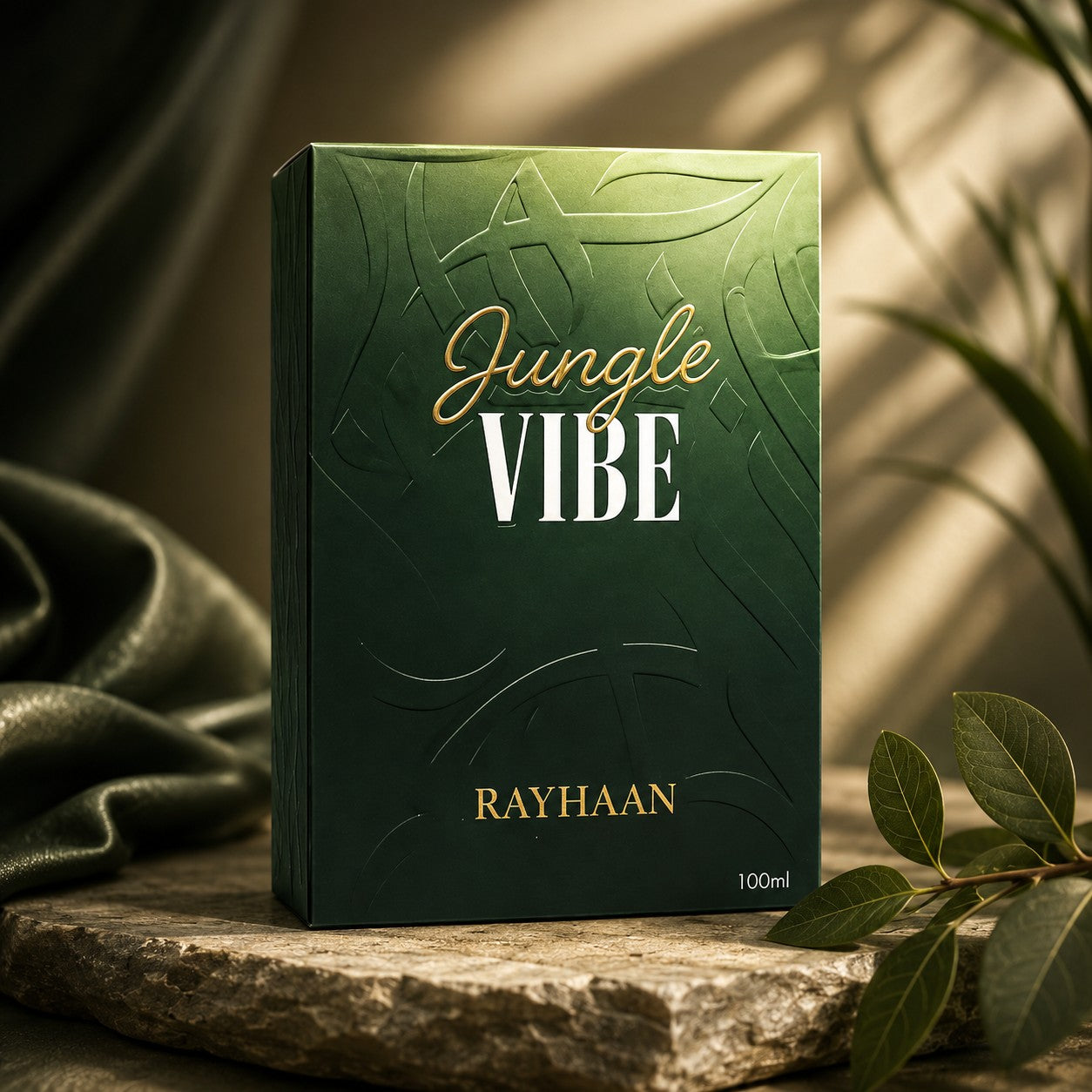 Soghaat Rayhaan Jungle Vibe 100ml Eau de Parfum in a dark green embossed box on a stone surface with foliage.