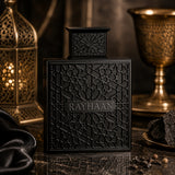 Rayhaan Obsidian Eau de Parfum by Soghaat in a black, intricately patterned bottle on a dark marble surface.