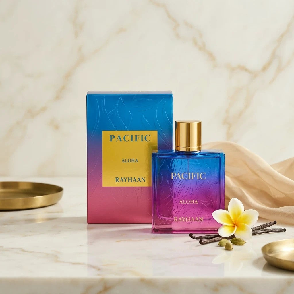 Soghaat Rayhaan Pacific Aloha unisex Eau de Parfum in a blue and pink gradient bottle with gold cap on marble surface