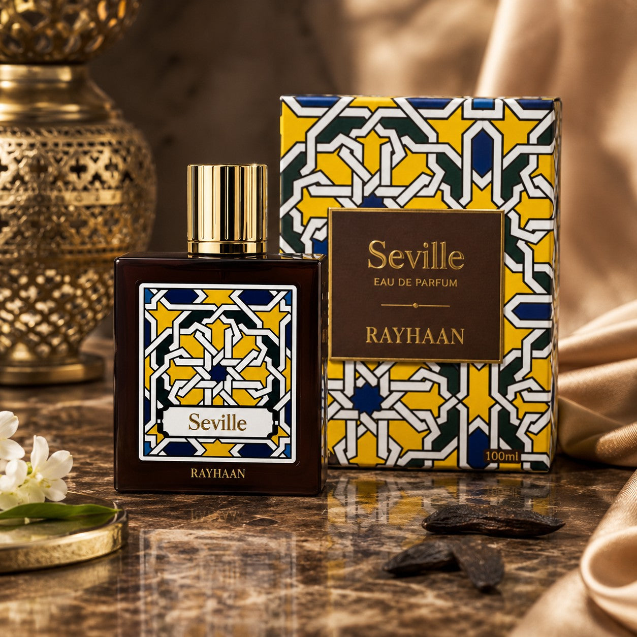 Soghaat Rayhaan Seville Eau de Parfum 100ml bottle and box with gold cap, featuring geometric patterns in yellow, blue, and white.