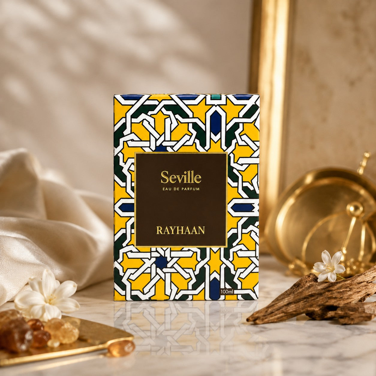 Soghaat Rayhaan Seville Eau de Parfum 100ml bottle with a yellow and geometric pattern. Fresh woody aromatic scent.