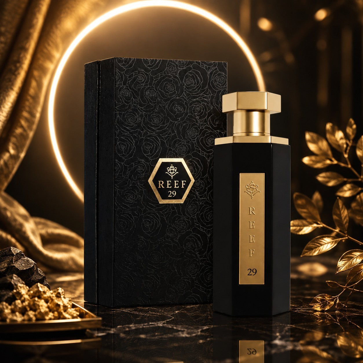Soghaat Reef 29 unisex Eau de Parfum bottle and black floral box with gold accents on a dark marble surface.