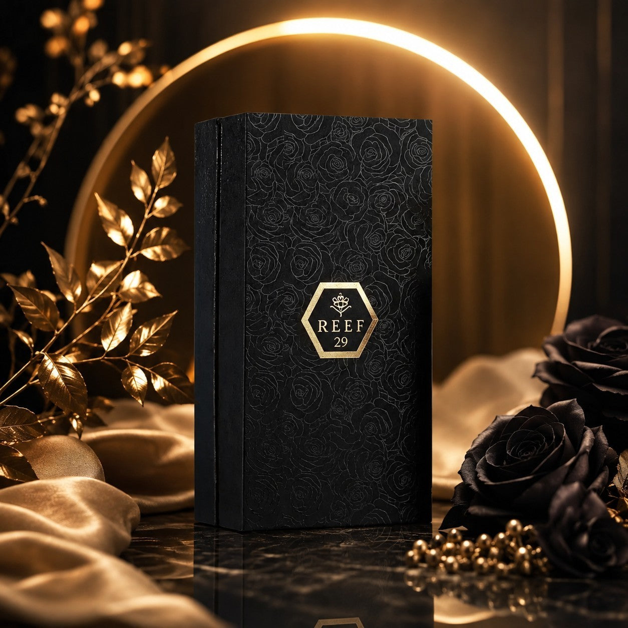 Soghaat Reef 29 Eau de Parfum in a black embossed floral box with gold branding, set against a dark, elegant background.