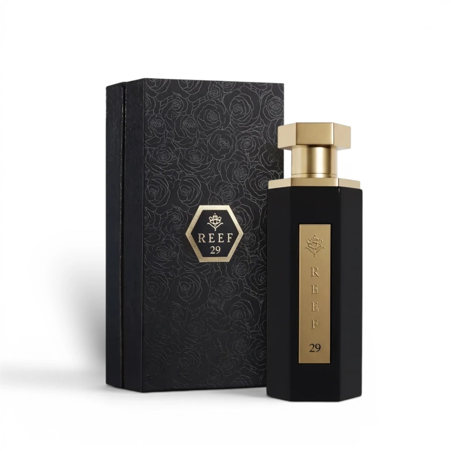 Soghaat Reef 29 unisex Eau de Parfum in a black hexagonal bottle with a gold cap, next to its matching floral box.