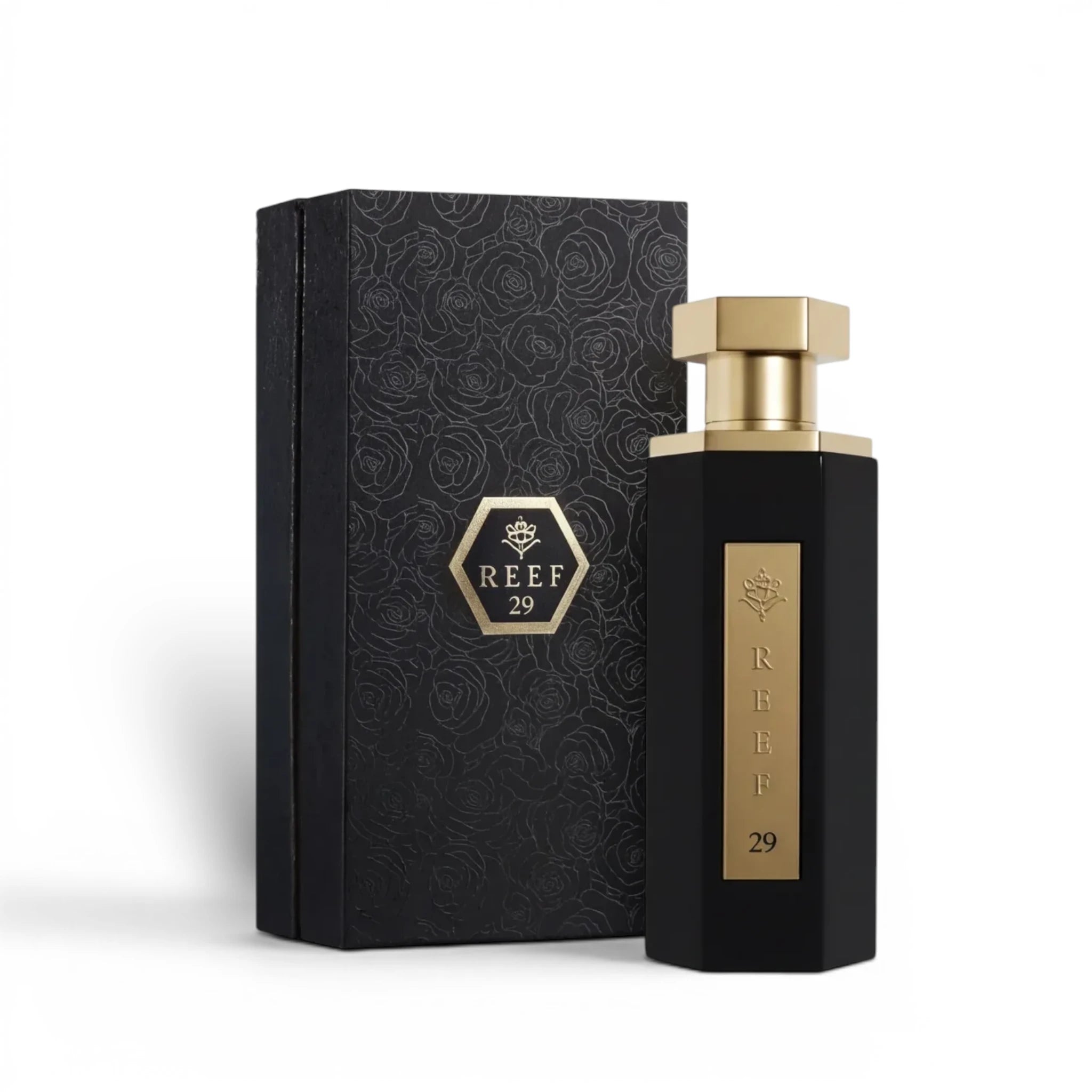 Soghaat Reef 29 unisex Eau de Parfum in a black hexagonal bottle with a gold cap, next to its matching floral box.