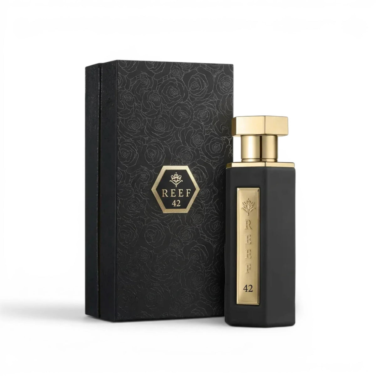 Soghaat Reef 42 unisex Eau de Parfum in a sleek black bottle with gold accents next to its matching floral box.