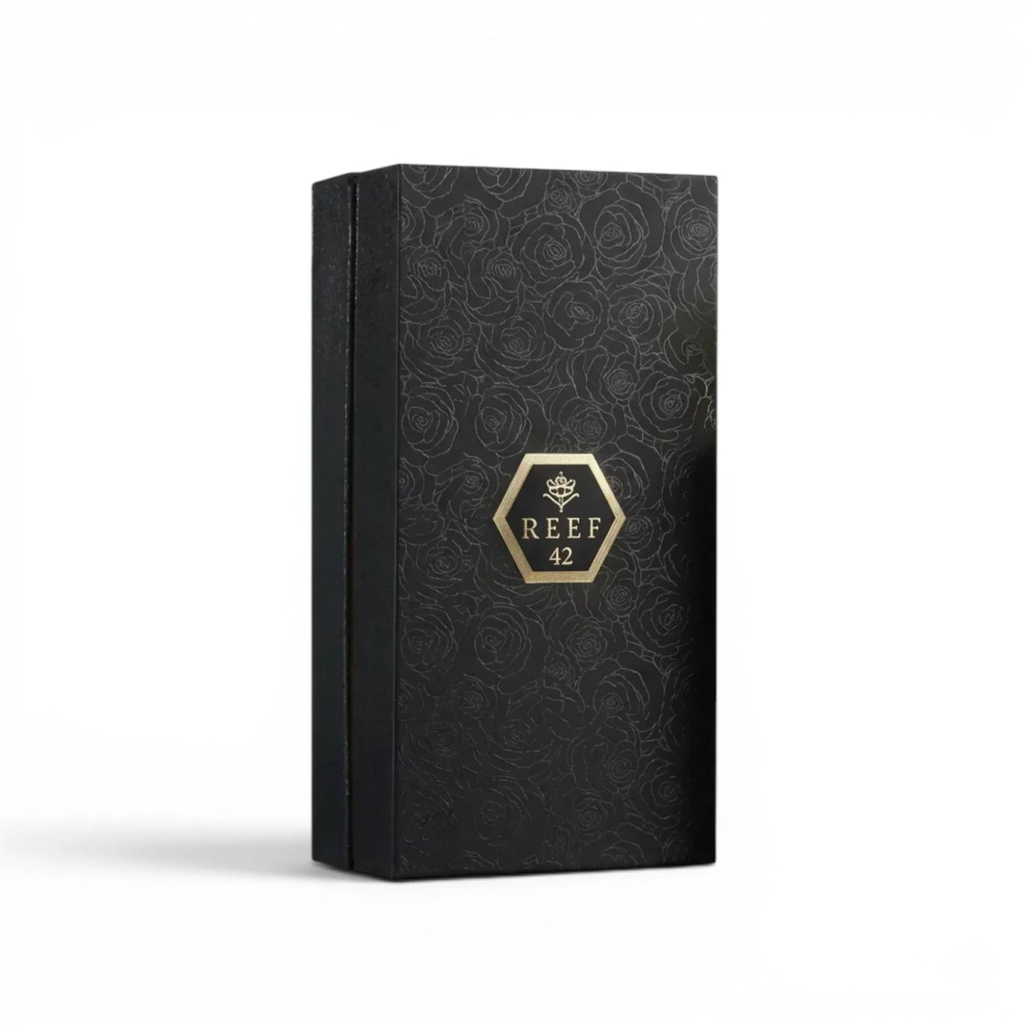 Soghaat Reef 42 Eau de Parfum in a black rectangular box with embossed rose patterns and a gold logo emblem.