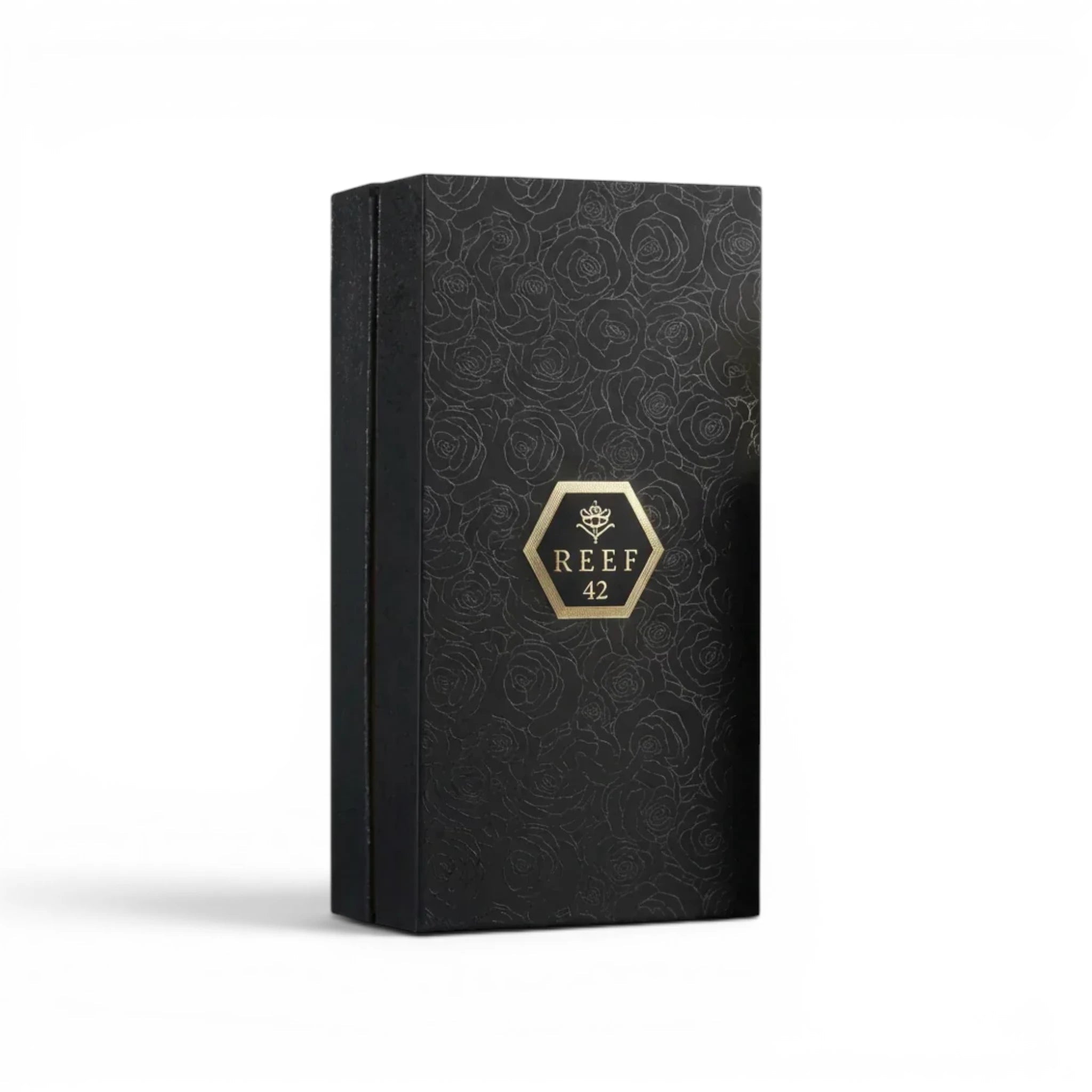 Soghaat Reef 42 Eau de Parfum in a black rectangular box with embossed rose patterns and a gold logo emblem.