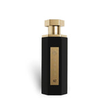 Soghaat Reef 42 unisex Eau de Parfum in a sleek black hexagonal bottle with a gold cap and label.